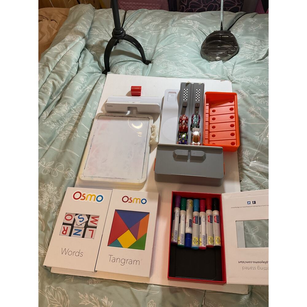 Osmo  gaming system Genius Starter Kit and the Hot Wheels MindRacers set.